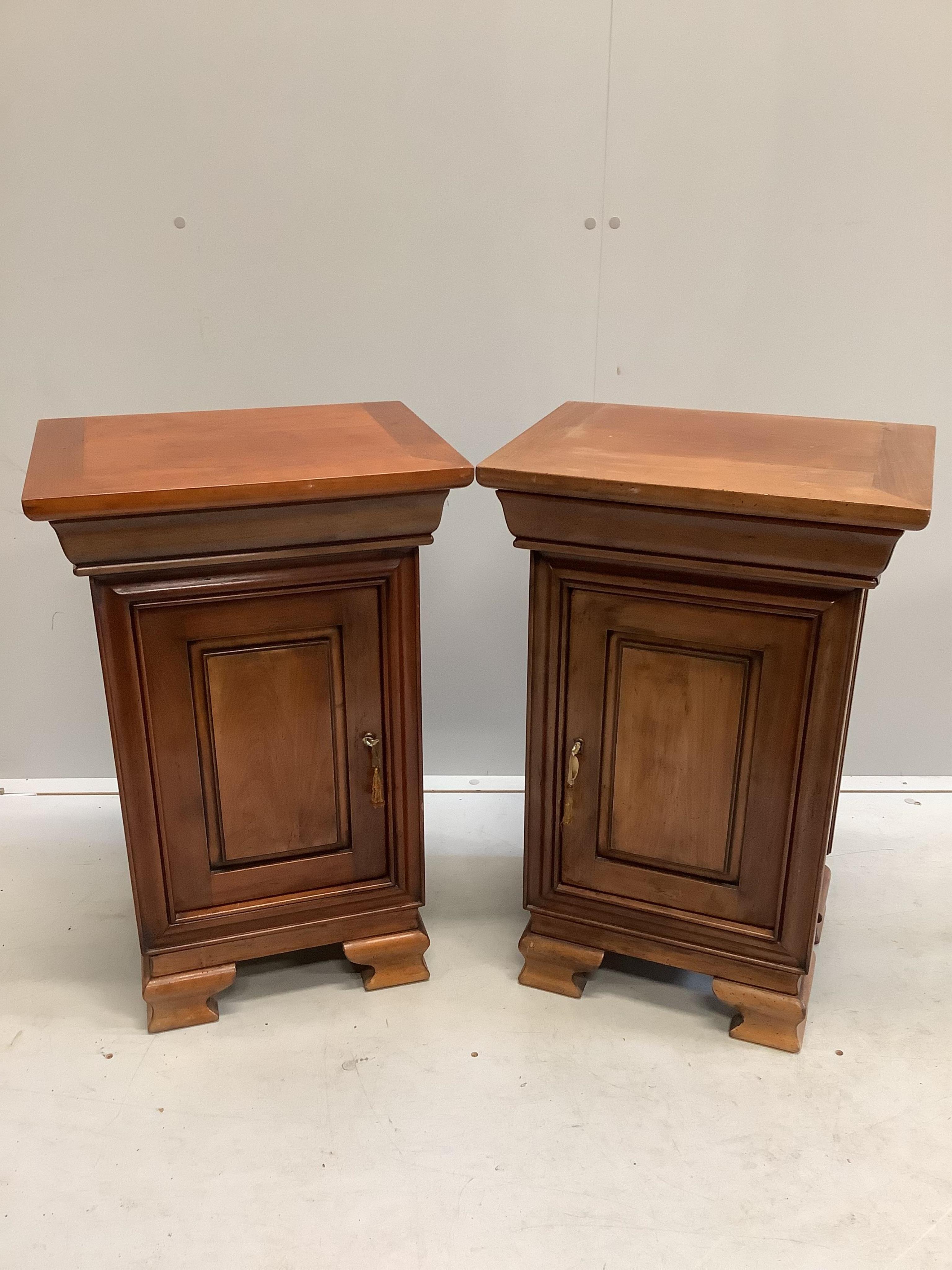 A pair of French style cherry bedside cabinets, width 44cm, depth 34cm, height 69cm